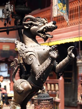 bronze statue of lion in temple in Nepal        