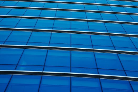 Modern office building detail, glass surface