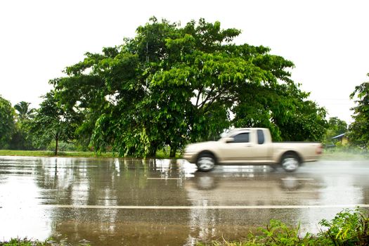 Car on wet roads