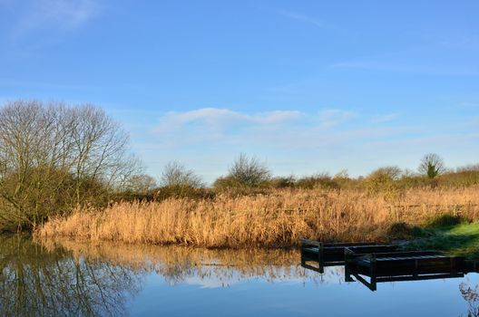 fishing platforms in winter river scene