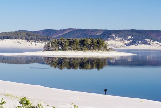 island in winter lake