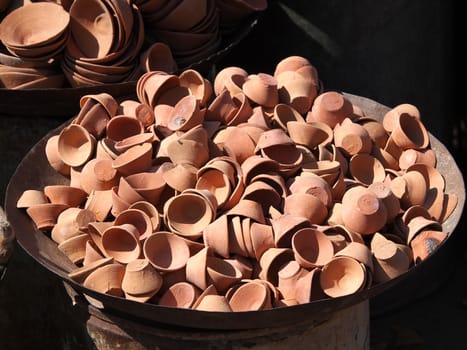 many small pots drying on the sun      