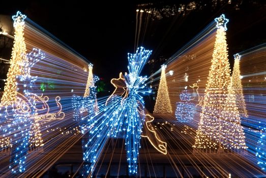 christmas sled, deers and trees bokeh light