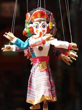puppet with three different faces       