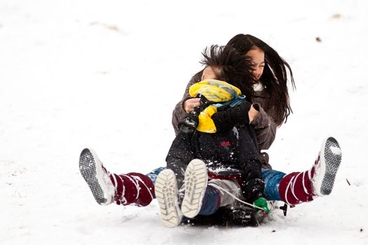 Girl sledging in winter in Denmark