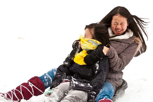 Girl sledging in winter in Denmark