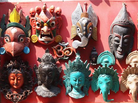 Nepali masks on display in the markets of Bhaktapur, Nepal       