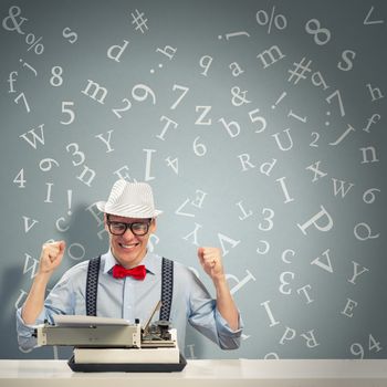 image of a young journalist, sitting at the table for a typewriter