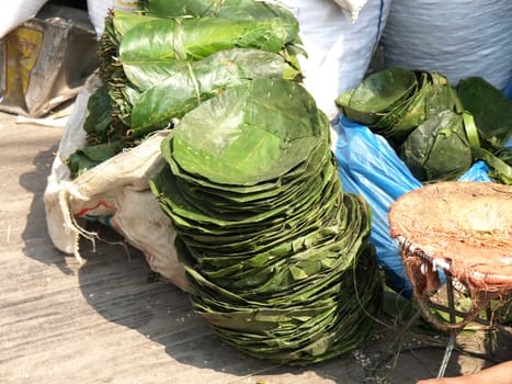 plates made of green leafs       