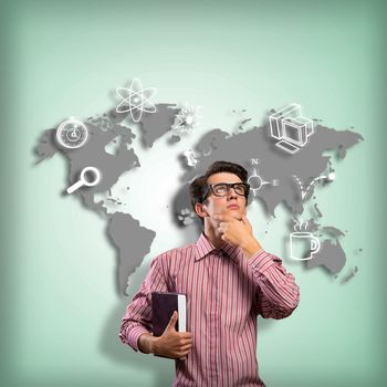 young man scientist in glasses thinking. next to it various painted symbols