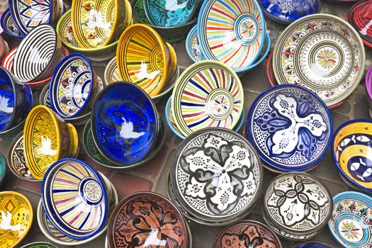Colorful Tajines for sale in a market stall