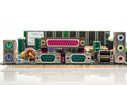close up of computer motherboard, back view of connectors