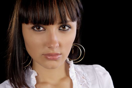 the beautiful girl close up on a black background