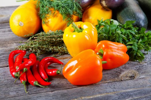 Still-life from vegetables on an old table