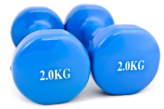 pair of 3 kg rubber dipped blue dumbbell, selective focus