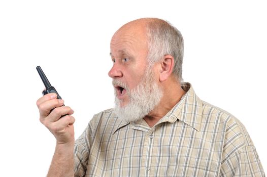 senior bald man talking using walkie-talkie, with mouth open