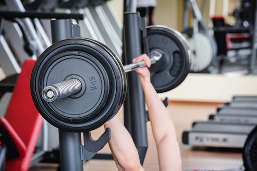 barbell bench press workout in the gym