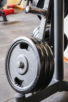 Barbell plates holder rack in the gym