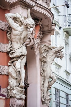 Statues near entrance, architectural details of Lvov Lviv, Ukraine.