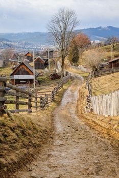 Dirty road in Carpathian village Vorokhta in the Ukraine