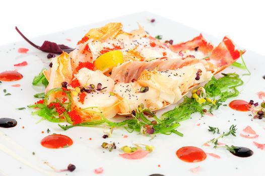 Lobster salad in japanese style with chuka seaweed and tobico