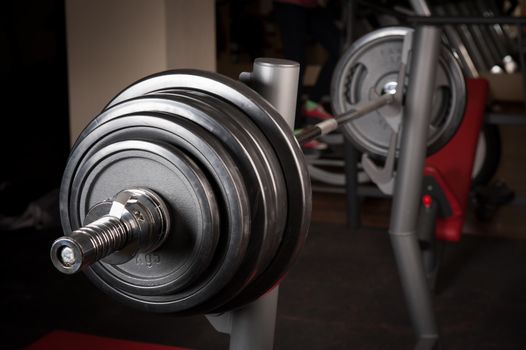 Barbell ready to workout, indooors, shallow DOF