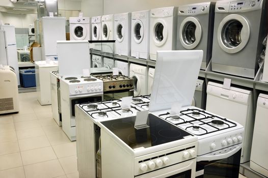 washing machines, stoves and ovens selling in appliance store