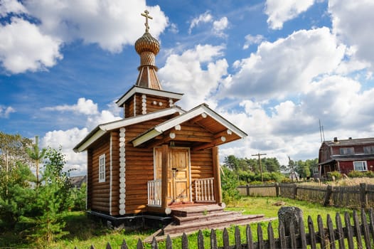 Small wooden Orthodox church in the Kindasovo village, Karelia, north of Russia