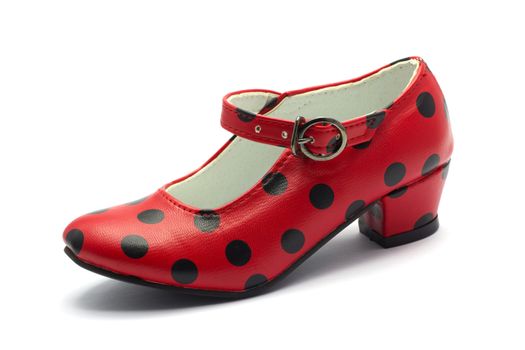 one Sevillian flamenco dancing shoe
Red shoe with black dots