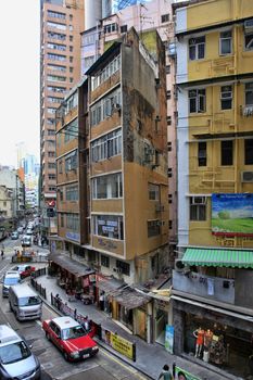 HONG KONG, CHINA - MARCH 28: Central District: old residential building. The city is one of the most populated areas in the world. Hong Kong, March 28, 2012.