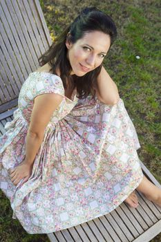 Woman gardening. Mature girl gardening in her backyard. spring season, rural scene