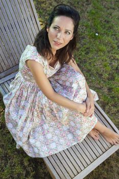 Woman gardening. Mature girl gardening in her backyard. spring season, rural scene