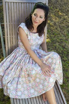 Woman gardening. Mature girl gardening in her backyard. spring season, rural scene