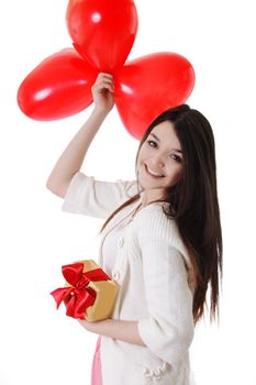 Smiling girl with red balloons and gift isoolated on white