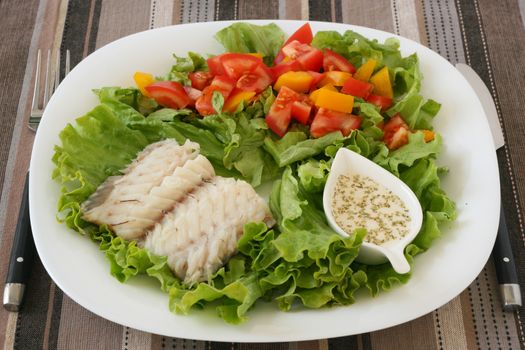 boiled fish with salad