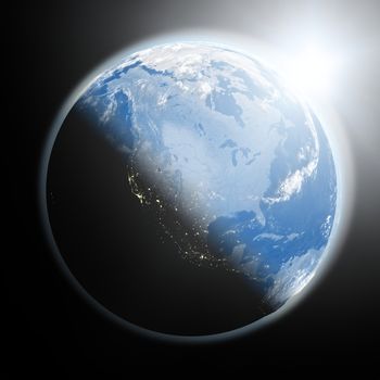 Space view of the sun rising over North America on blue planet Earth. Elements of this image furnished by NASA.