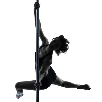 one caucasian woman pole dancer dancing in silhouette studio isolated on white background