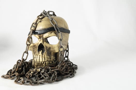 Skull and old Chains on a White Background