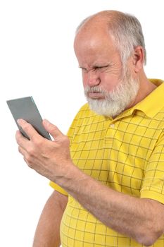 senior bald man wih puffed up cheeks looks into mirror