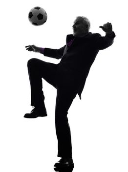 One Caucasian Senior Business Man playing soccer Silhouette White Background