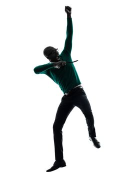 one african black man jumping happy in silhouette studio on white background