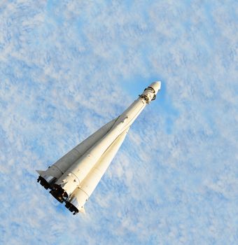 The Fist Russian Space Ship on the Background of the Cloudy Sky