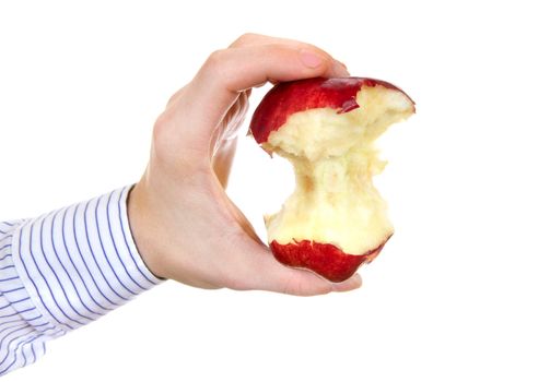 Person holding Core of an Apple closeup Isolated on the White Background