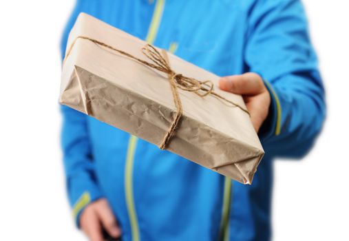 Male courier service worker holding parcel delivering package