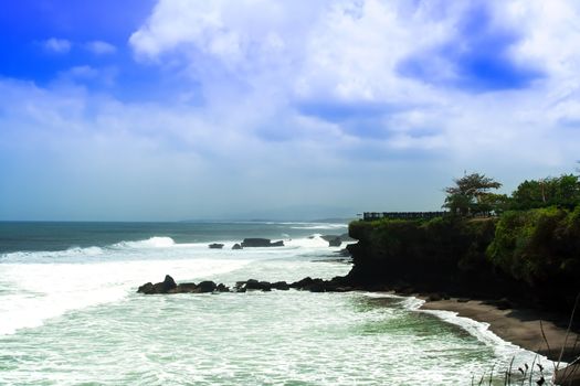 Coast near Tanah Lot, Bali. Indonesia. Ocean beach.