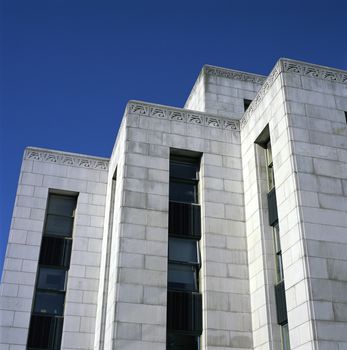 Large concrete building with blue sky