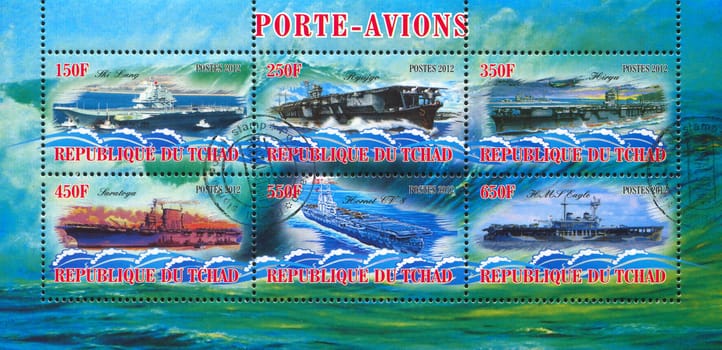 CHAD - CIRCA 2012: stamp printed by Chad, shows aircraft carrier, circa 2012
