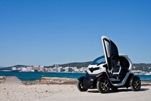 Electric car and beach background