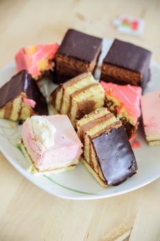 Different homemade sweets on a white plate