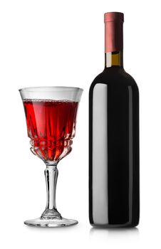 Glass of red wine and bottle isolated on white background